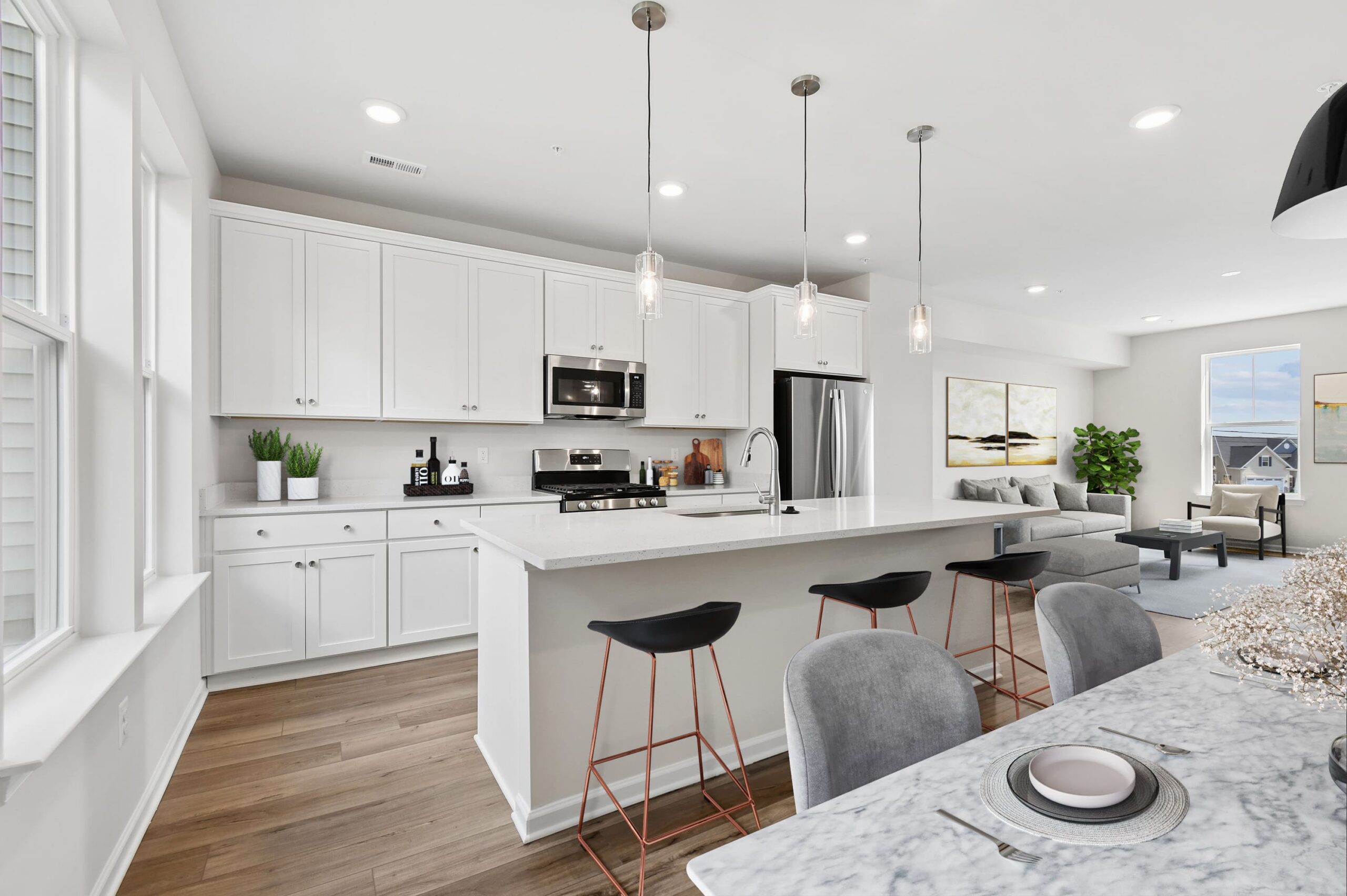 Contemporary kitchen with white cabinetry
