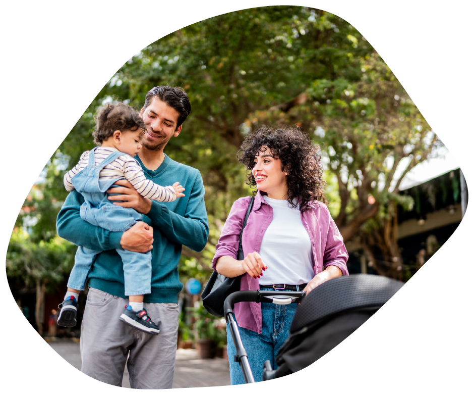 Parent and child walking outdoors together, smiling